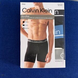 Calvin Klein Men's Black and Blue Boxer Briefs - 3 Pack
